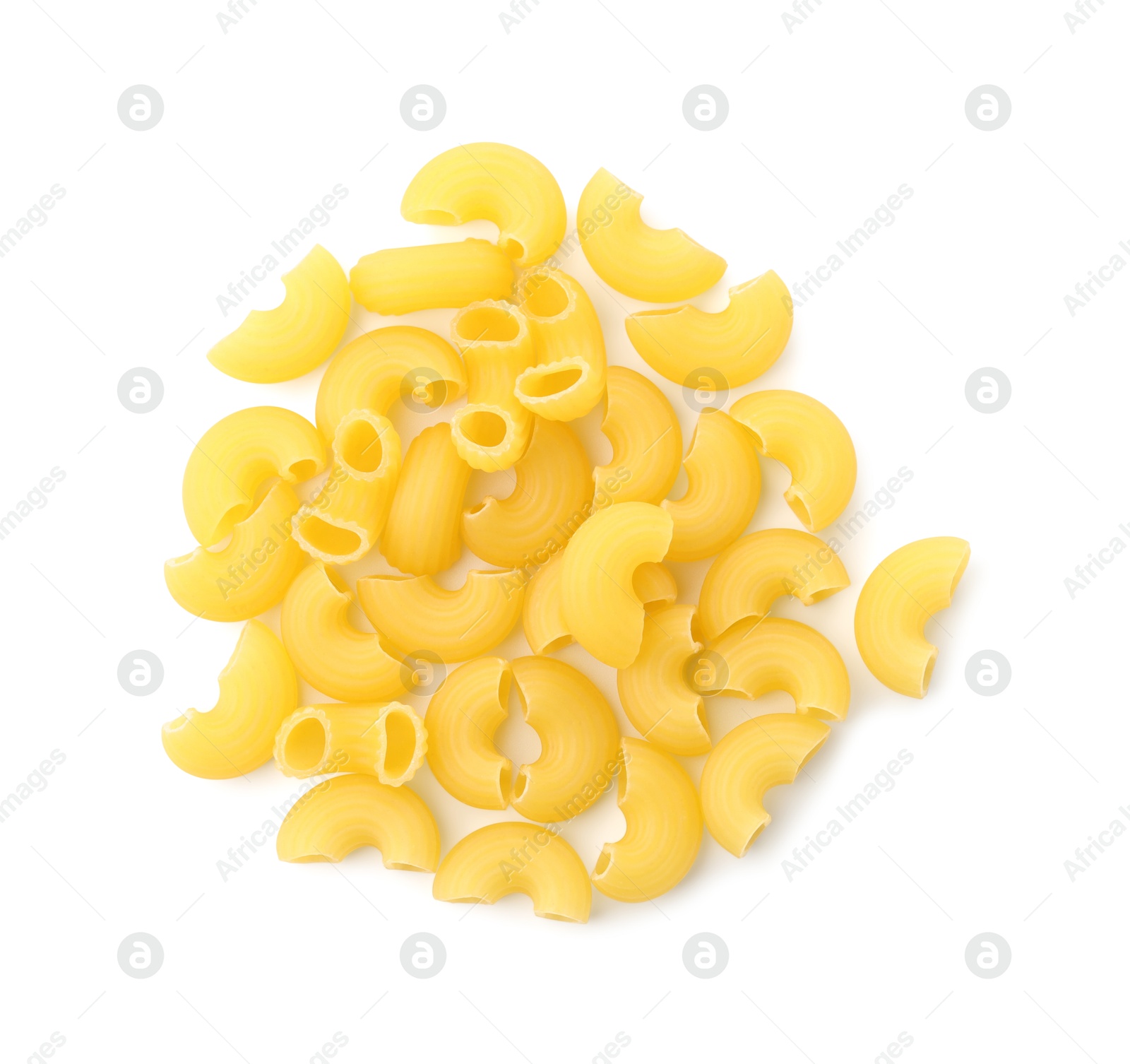 Photo of Pile of raw horns pasta isolated on white, top view