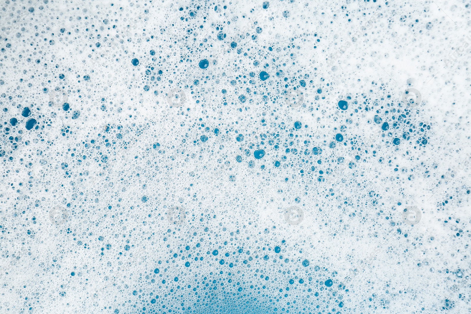 Photo of Detergent foam with bubbles as background, top view