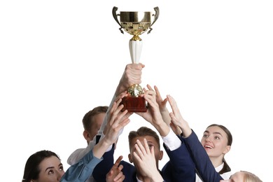 Photo of Competition concept. Group of businesspeople with golden trophy on white background, closeup