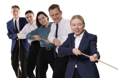 Photo of Competition concept. Group of happy businesspeople pulling rope on white background