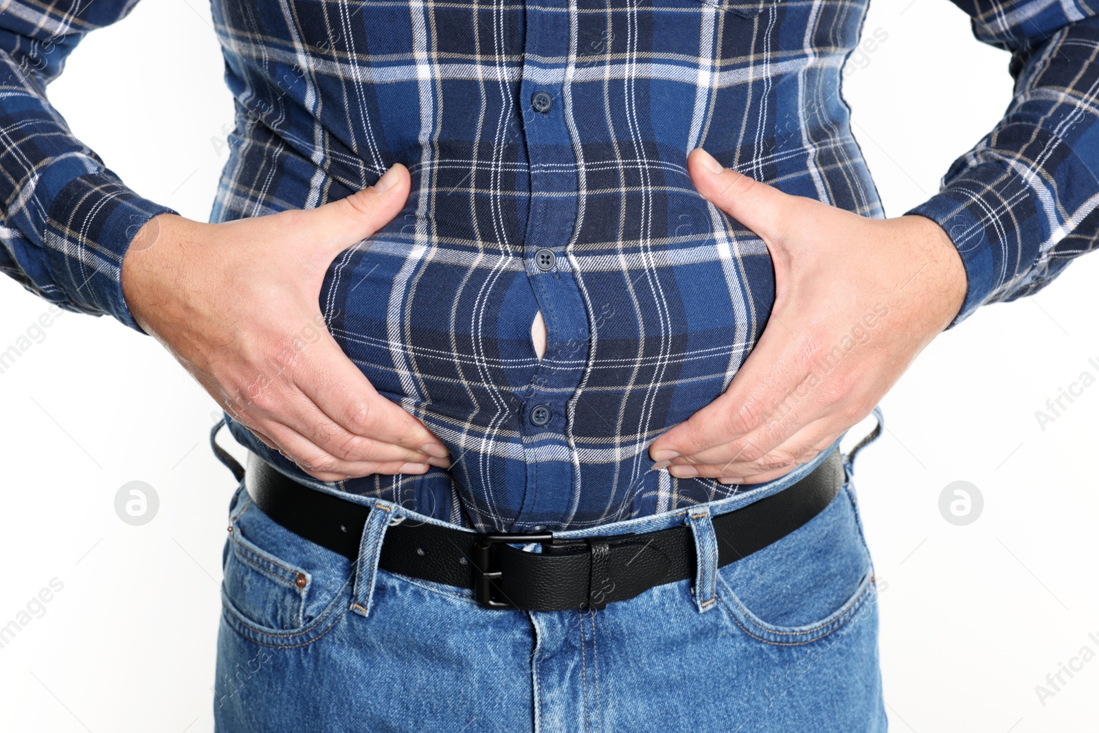 Photo of Overweight man in tight shirt on white background, closeup