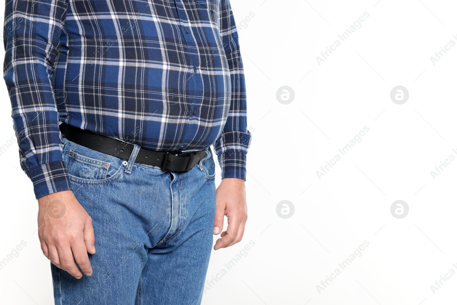 Photo of Overweight man in tight shirt on white background, closeup. Space for text