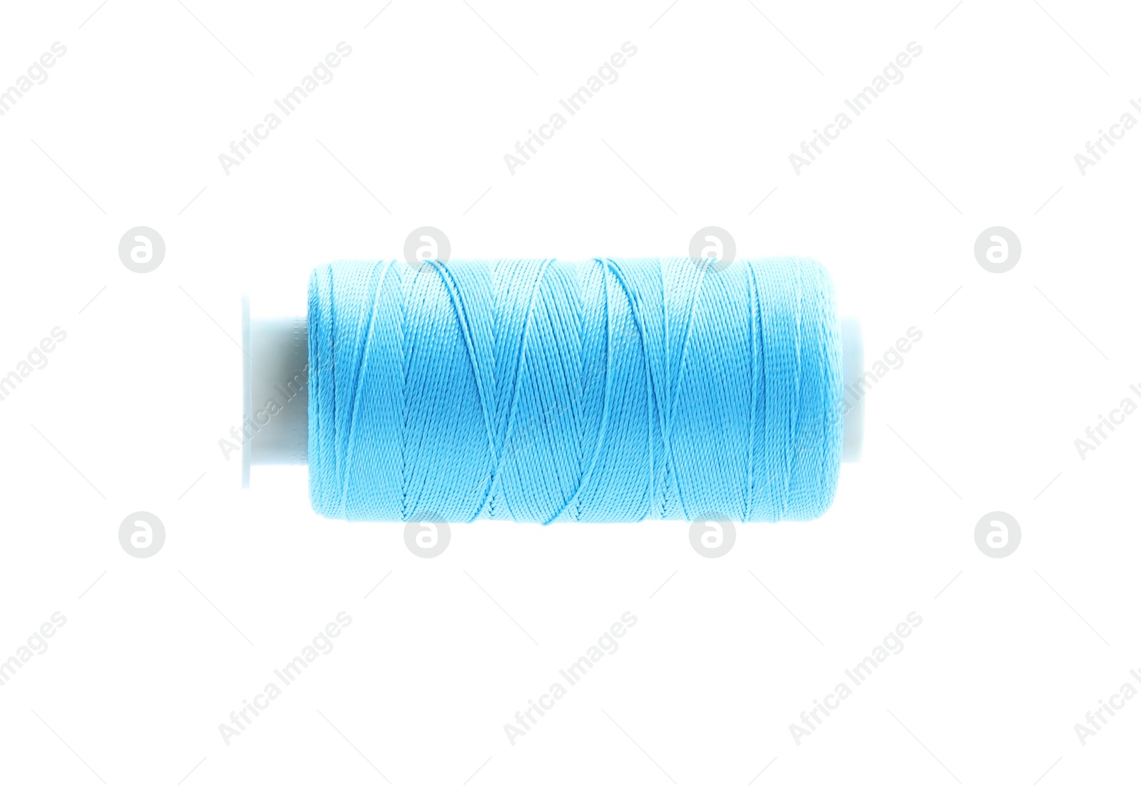 Photo of One spool of sewing thread isolated on white