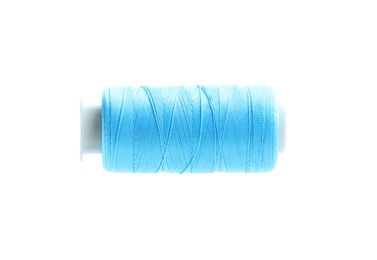 Photo of One spool of sewing thread isolated on white