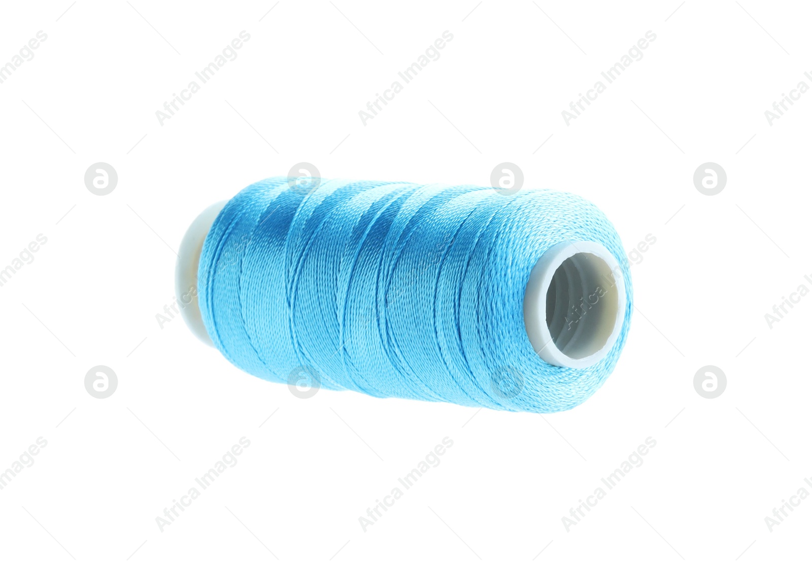 Photo of One spool of sewing thread isolated on white