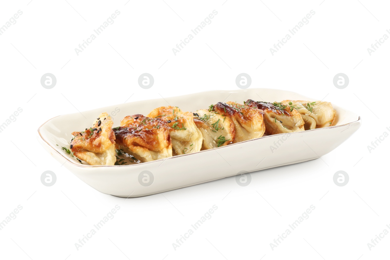 Photo of Tasty fried gyoza (dumplings) isolated on white