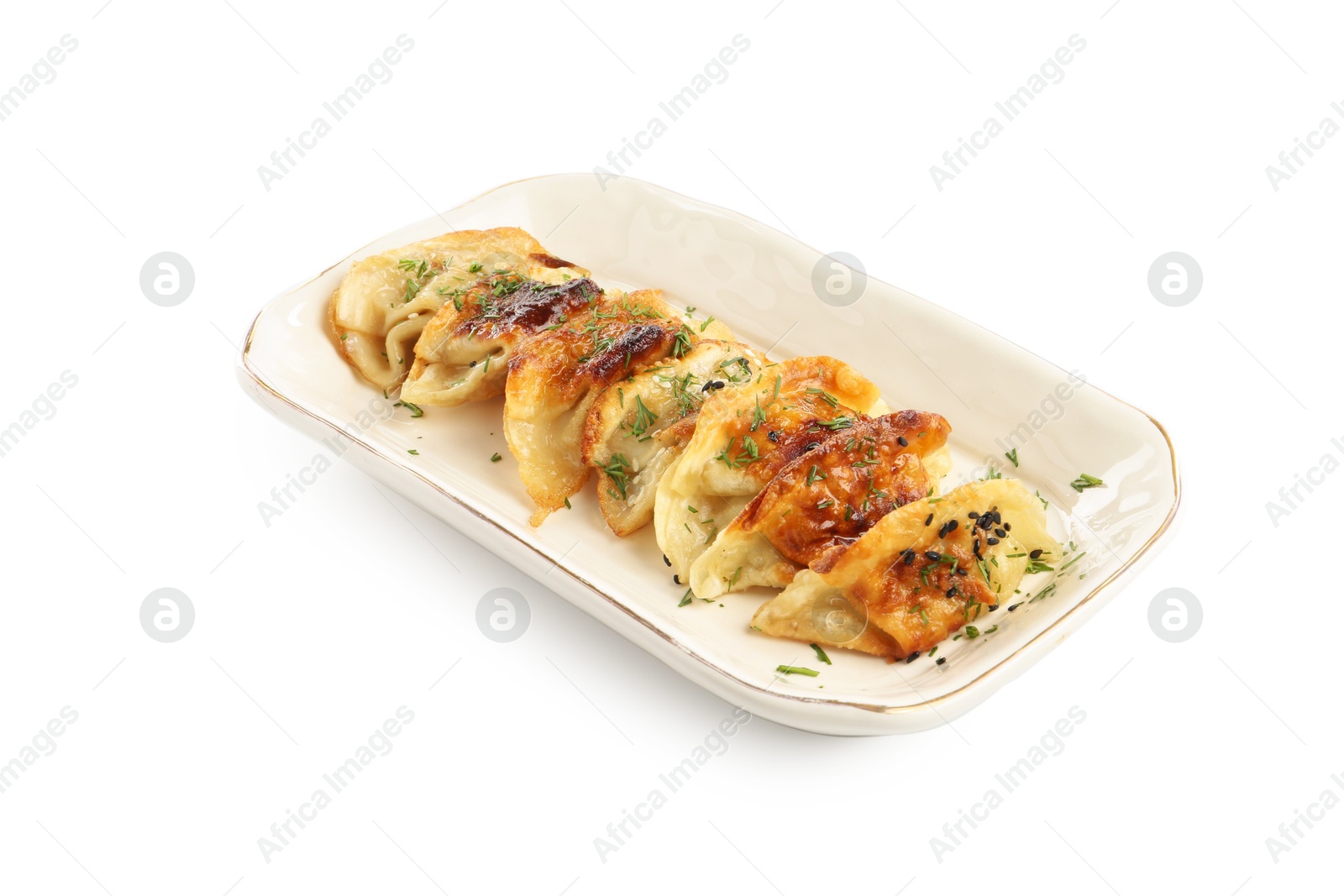 Photo of Tasty fried gyoza (dumplings) isolated on white