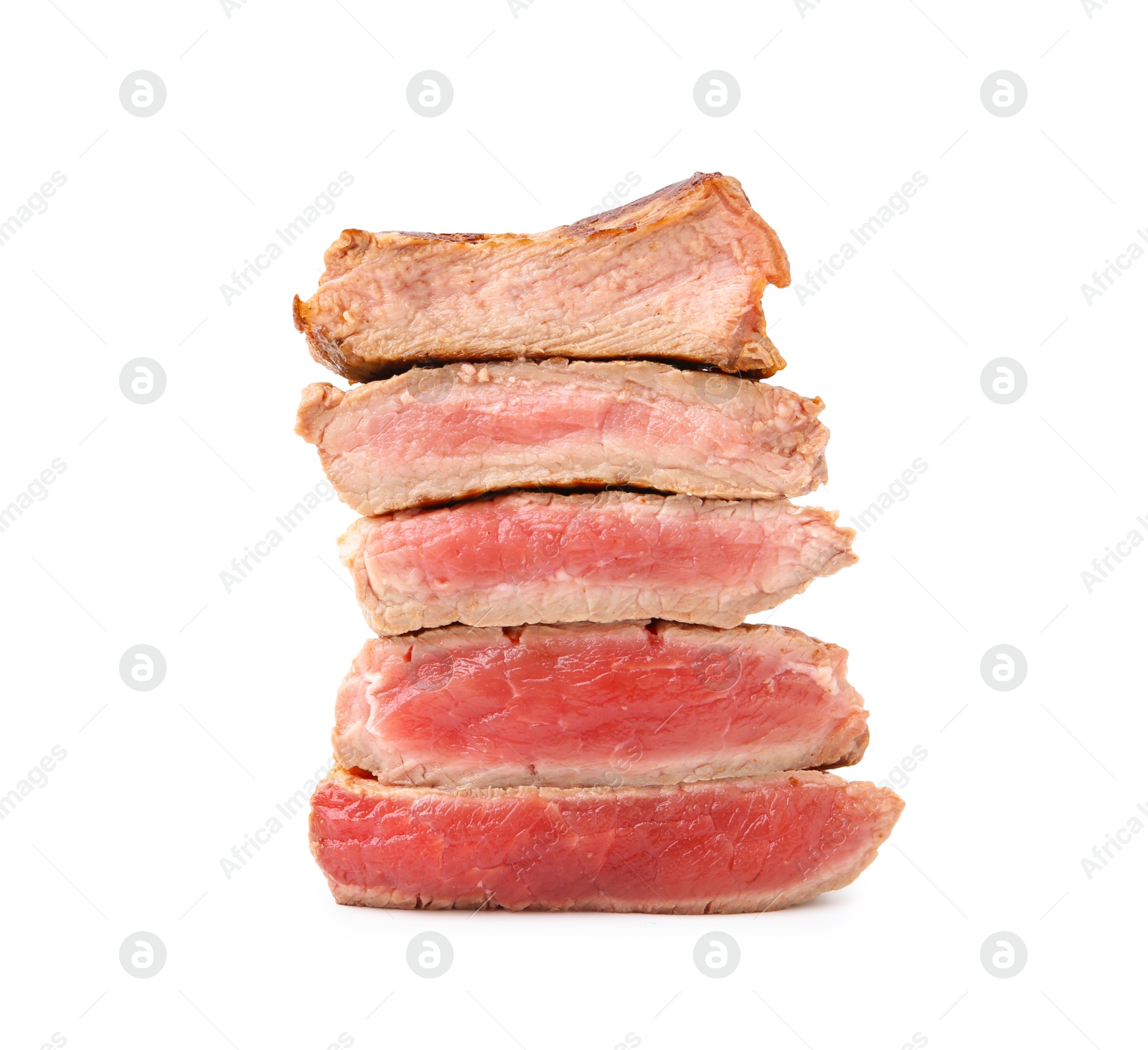 Photo of Delicious sliced beef tenderloin with different degrees of doneness isolated on white