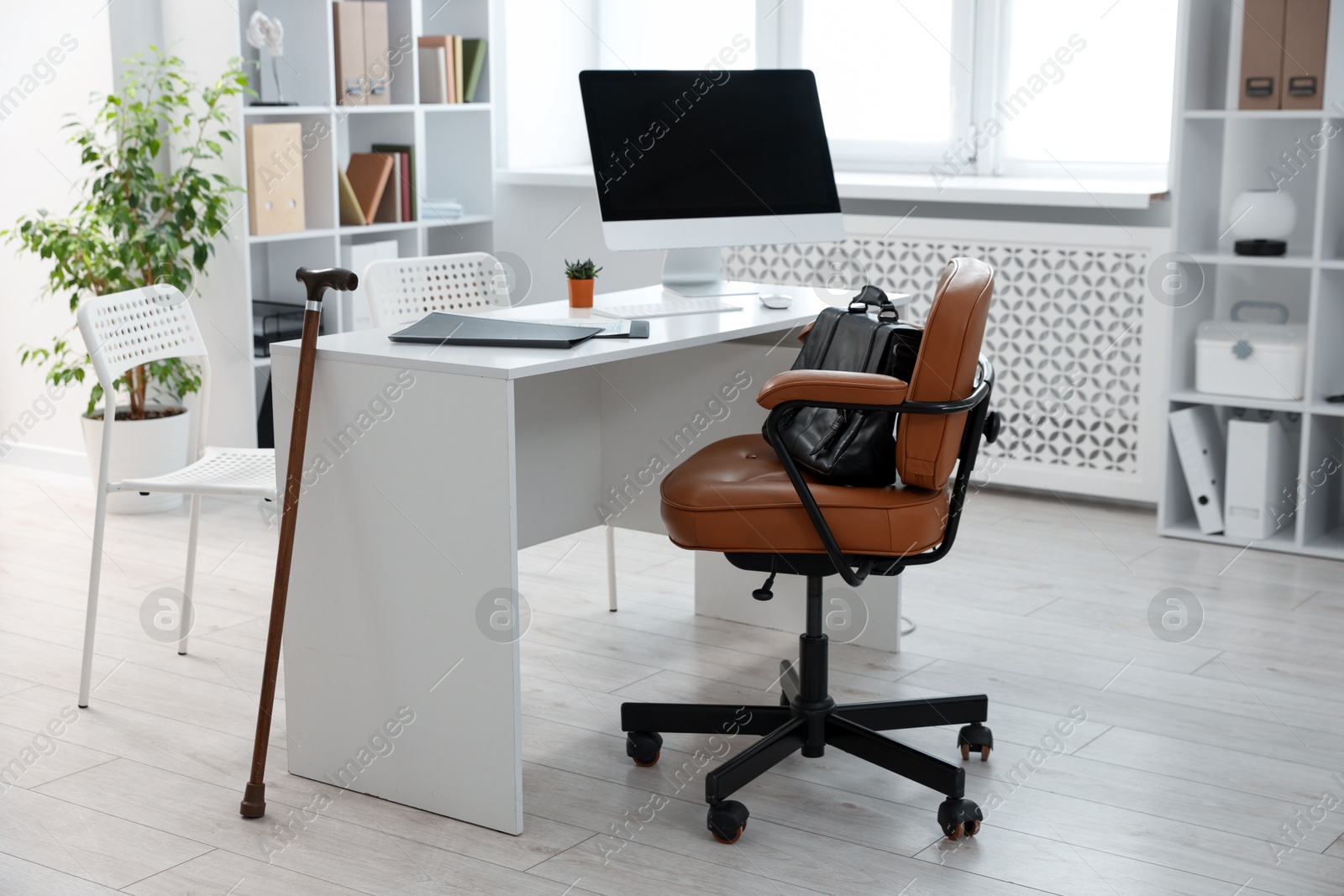 Photo of Doctor's workplace in medical office. Healthcare service