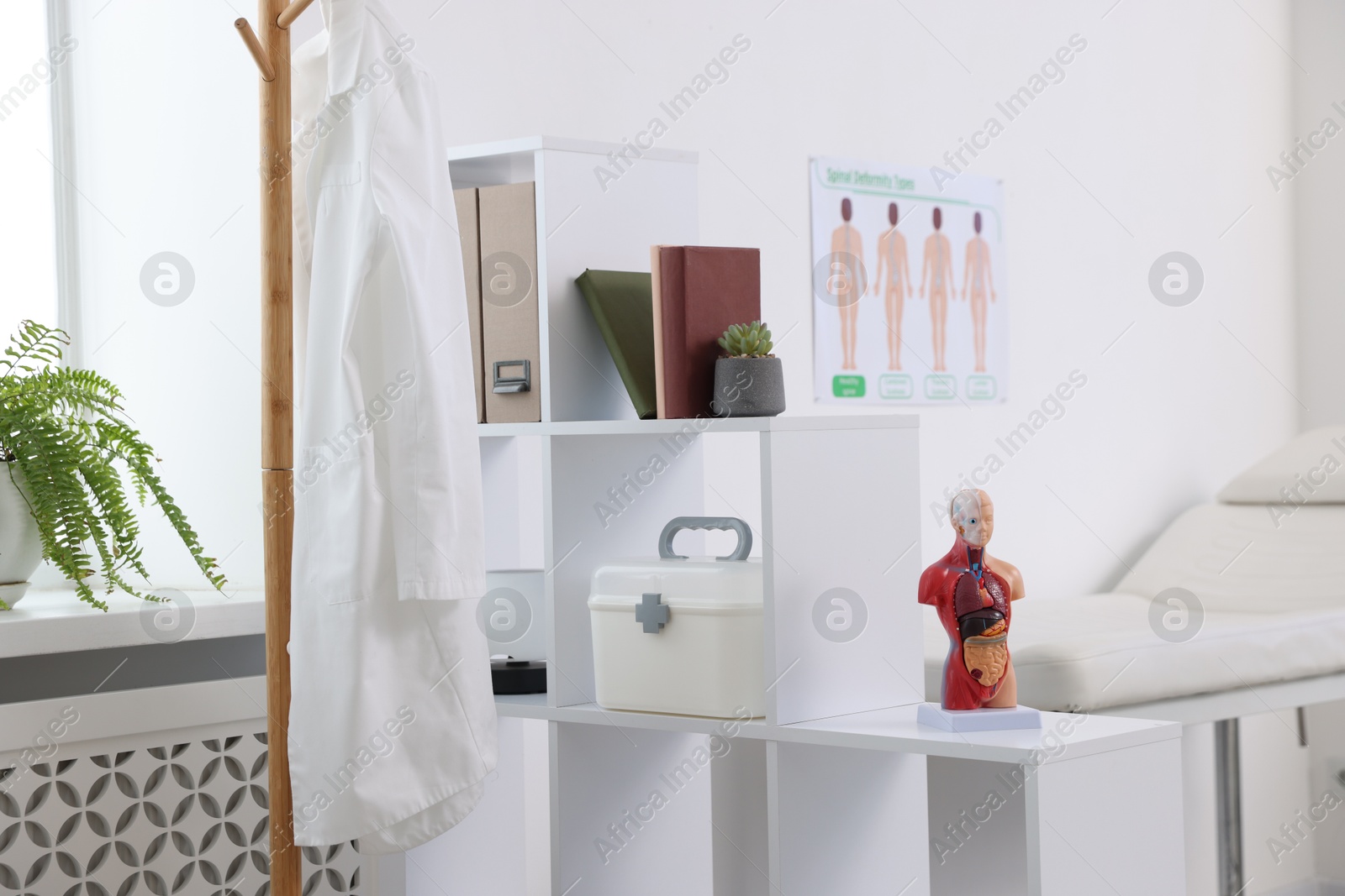 Photo of Doctor's coat on rack in medical office