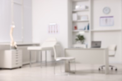 Photo of Blurred view of doctor's workplace in medical office