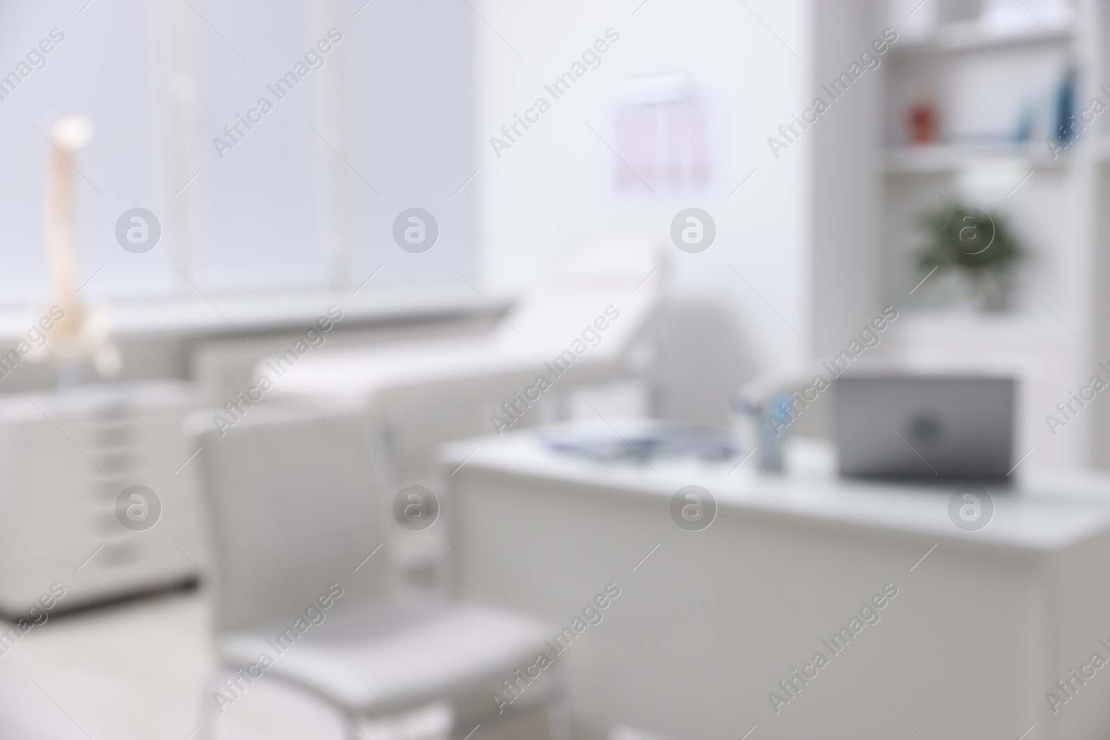 Photo of Blurred view of doctor's workplace in medical office