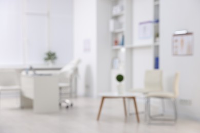 Photo of Blurred view of doctor's workplace in medical office