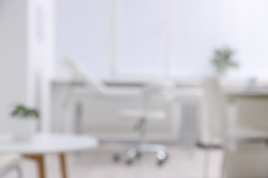 Photo of Blurred view of doctor's workplace in medical office