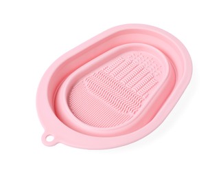 Photo of Silicone pad for cleaning makeup brushes isolated on white