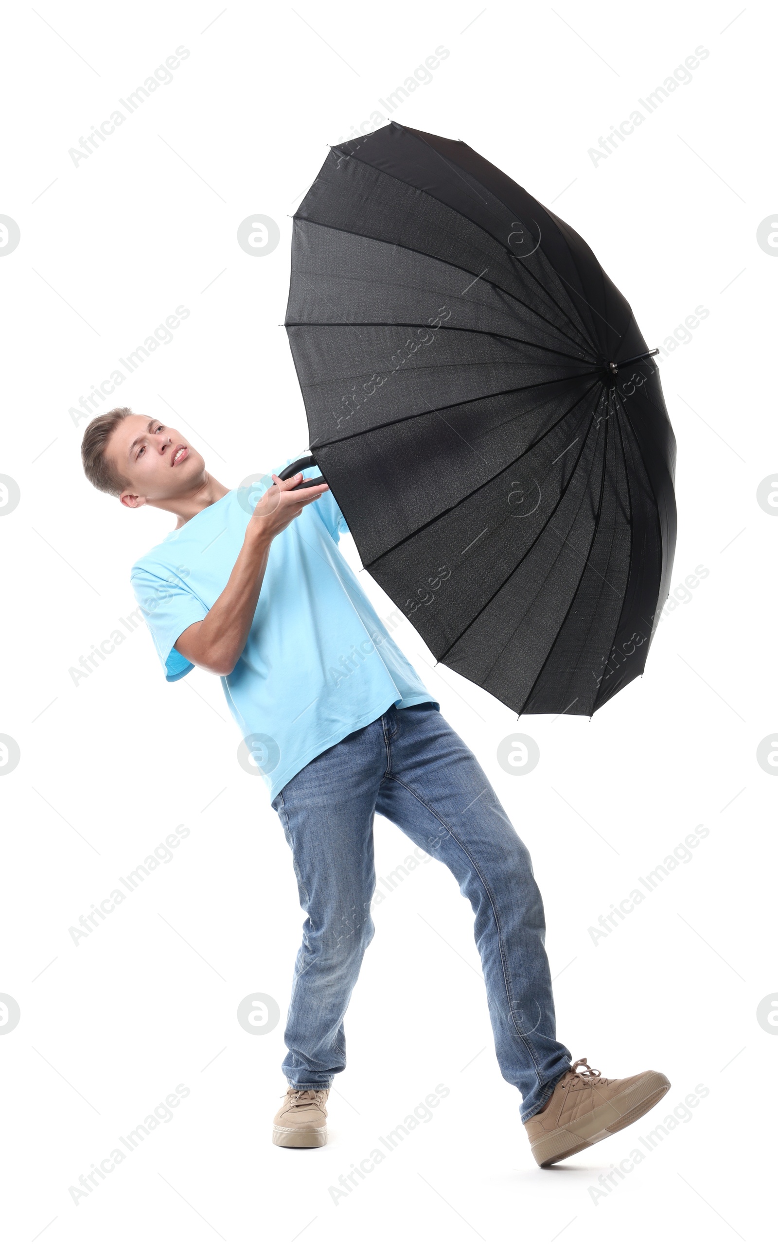 Photo of Man with black umbrella on white background