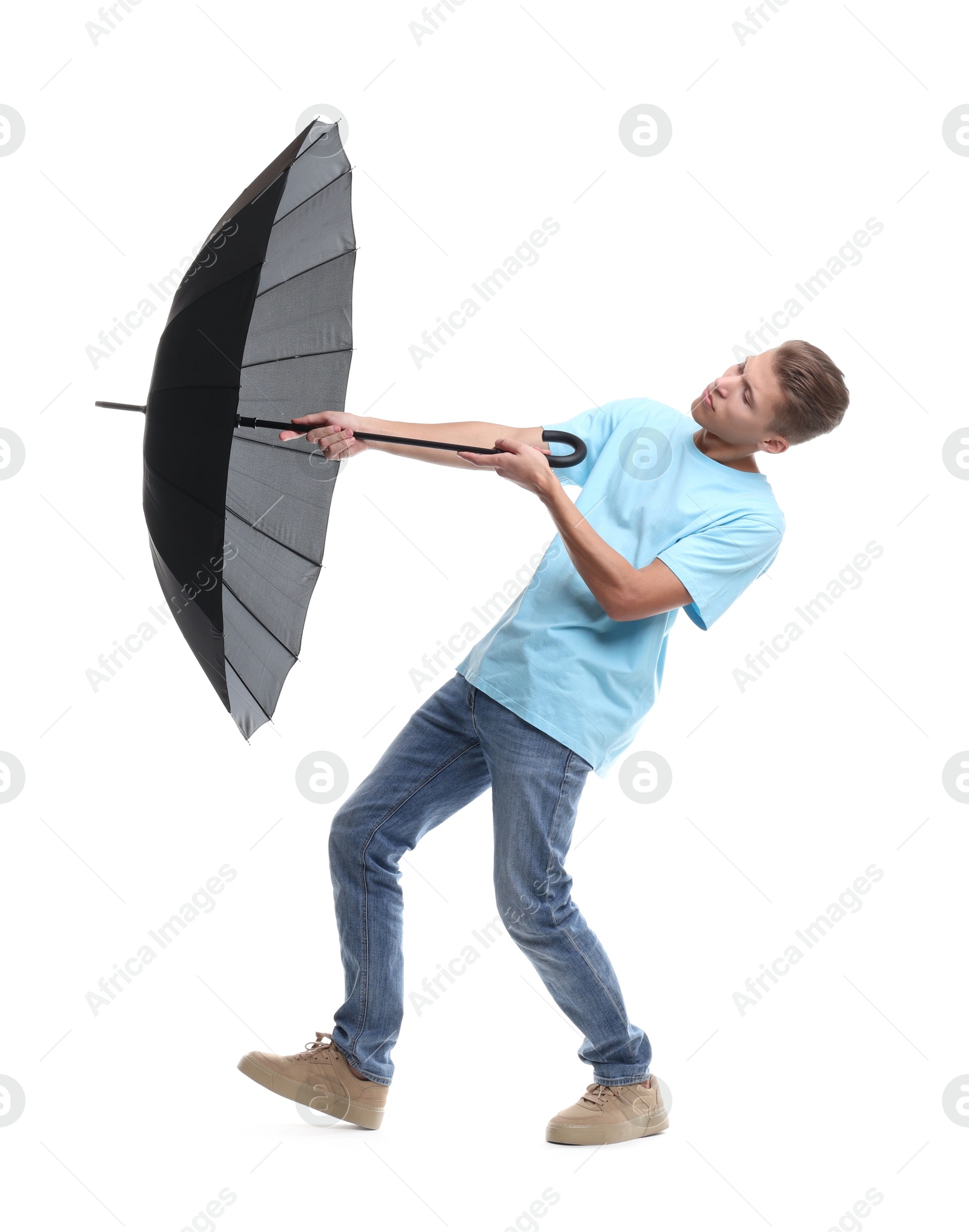 Photo of Man with black umbrella on white background