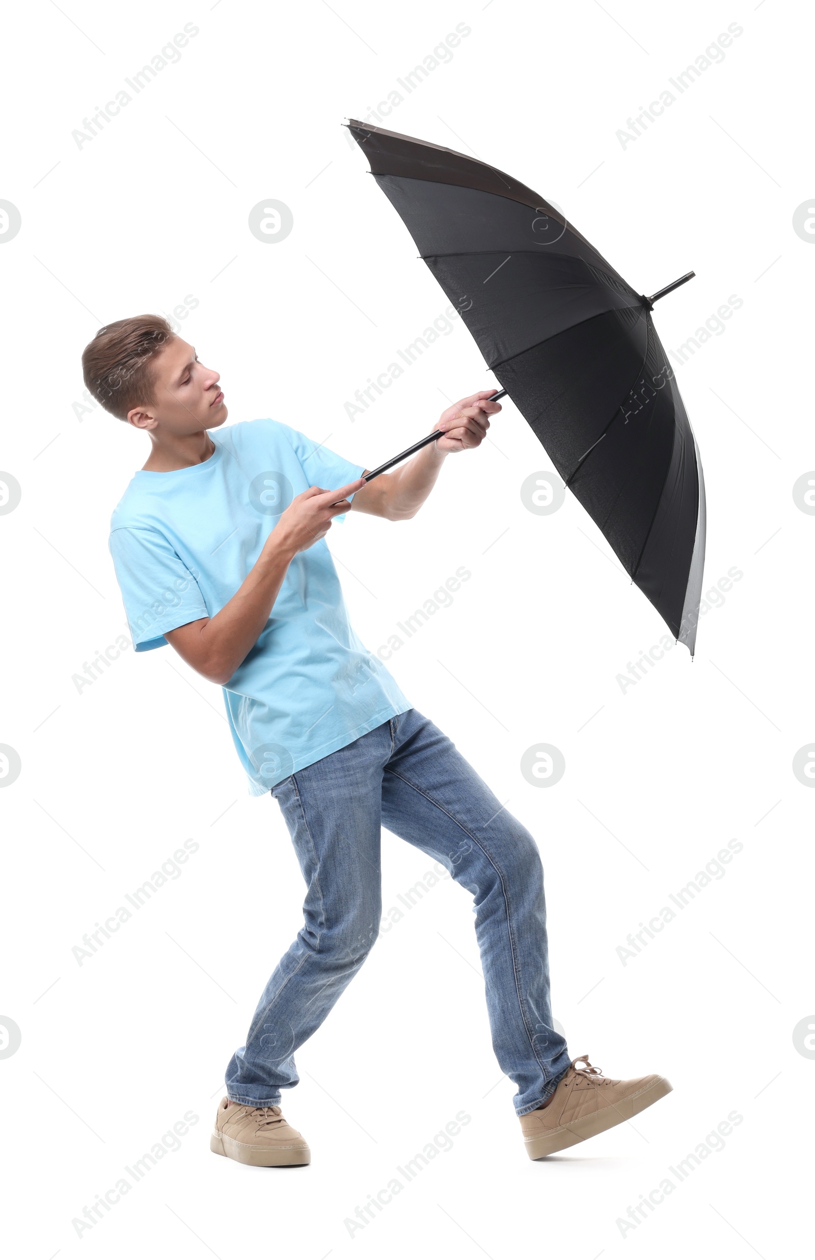 Photo of Man with black umbrella on white background