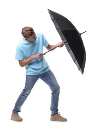 Photo of Man with black umbrella on white background