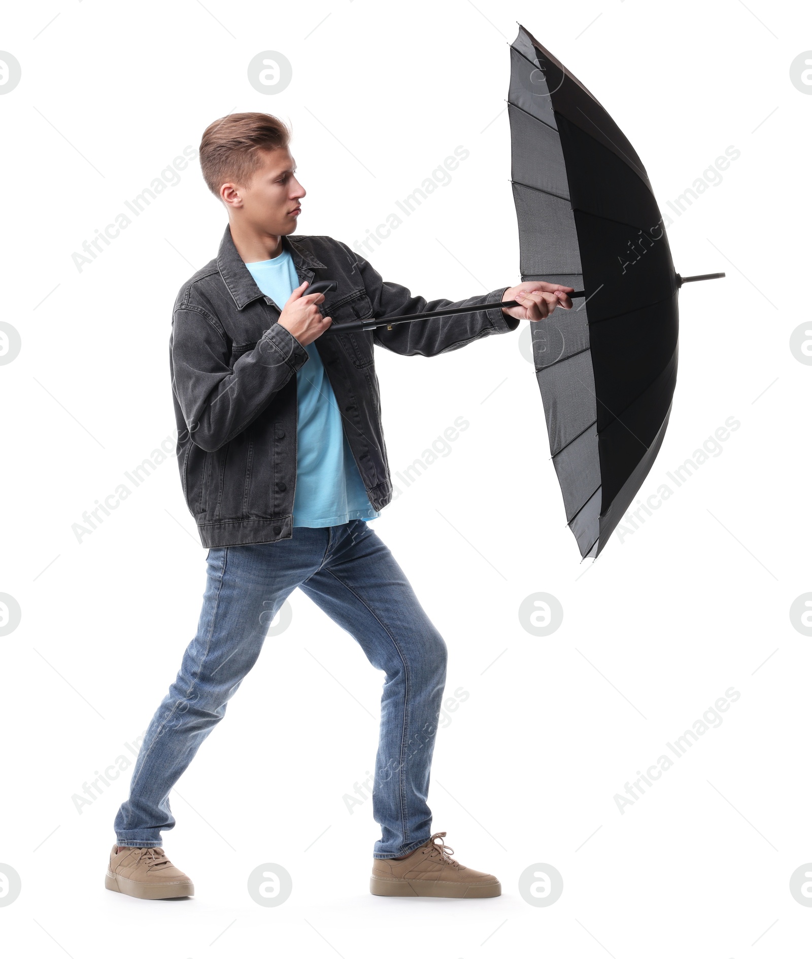 Photo of Man with black umbrella on white background