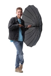 Photo of Man with black umbrella on white background