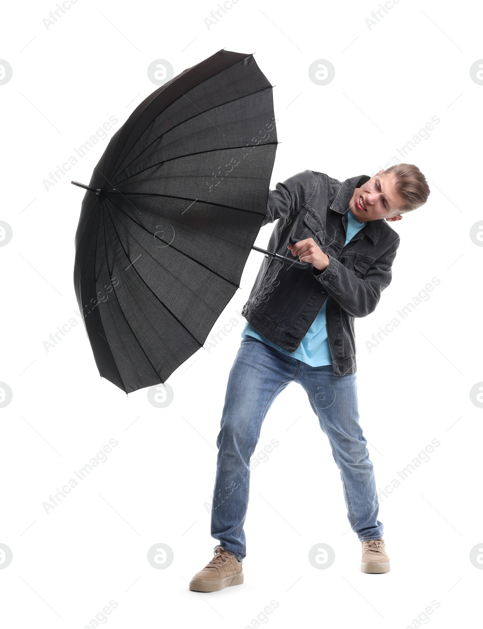 Photo of Man with black umbrella on white background