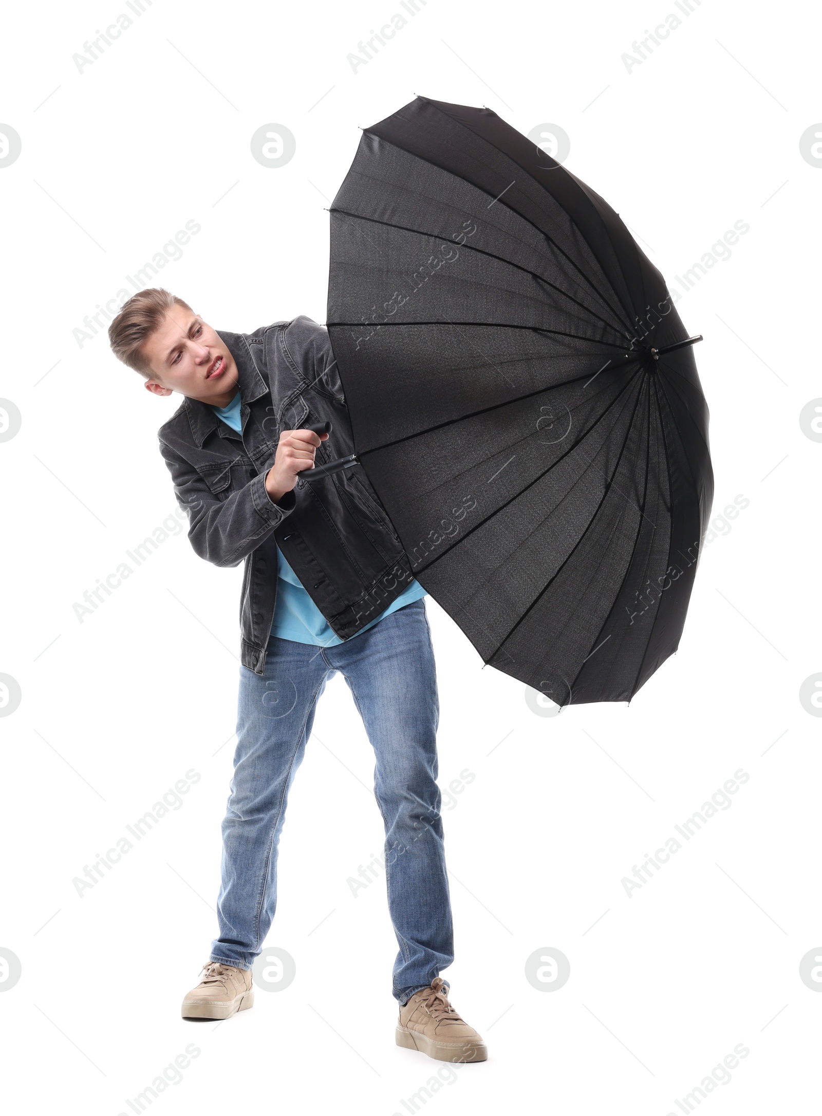 Photo of Man with black umbrella on white background