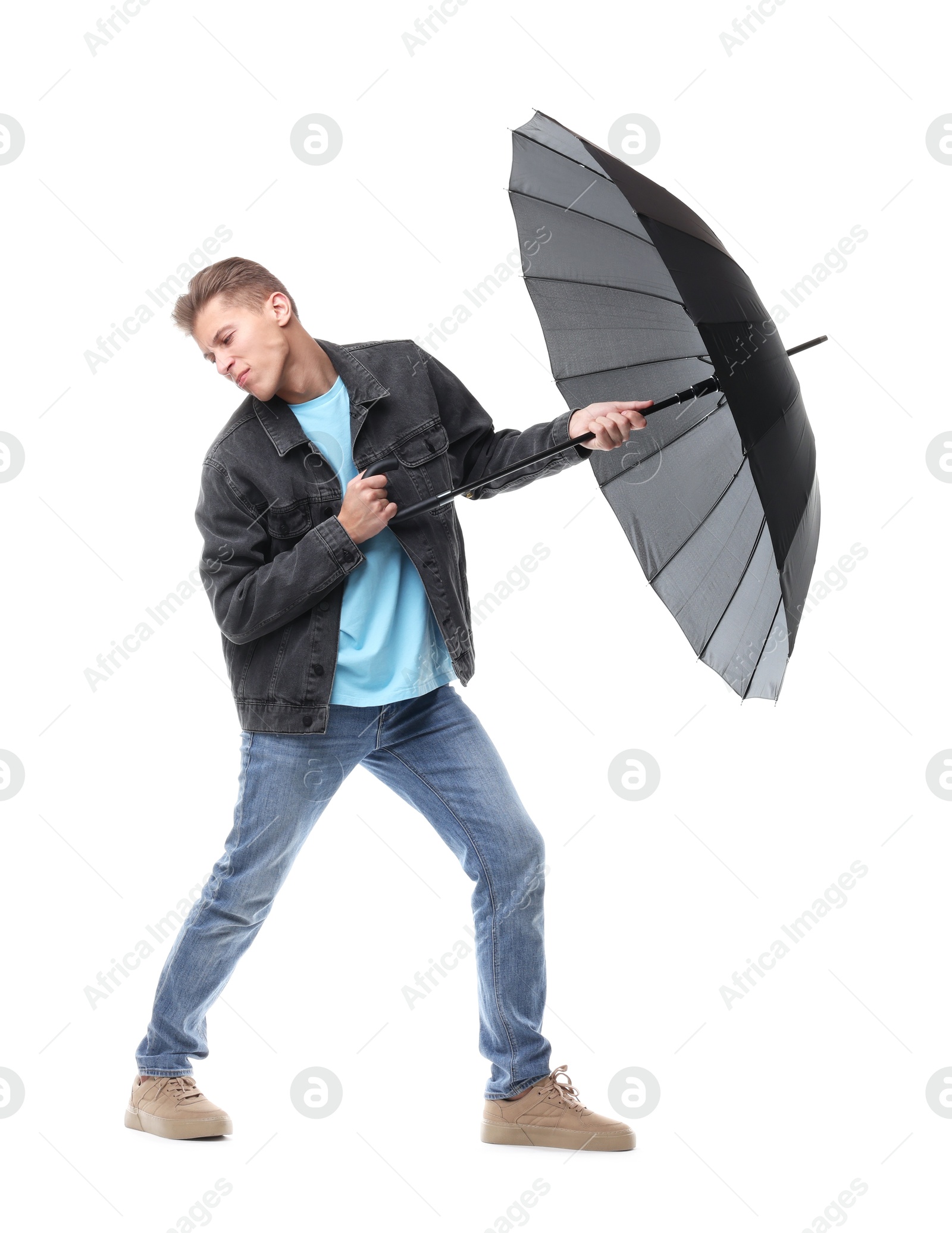 Photo of Man with black umbrella on white background