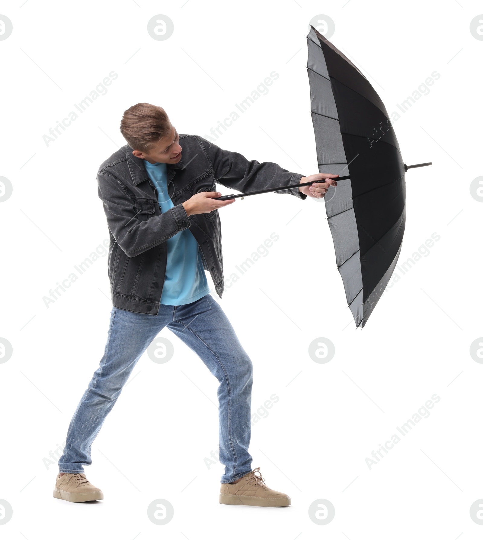 Photo of Man with black umbrella on white background