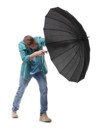 Photo of Man with black umbrella on white background