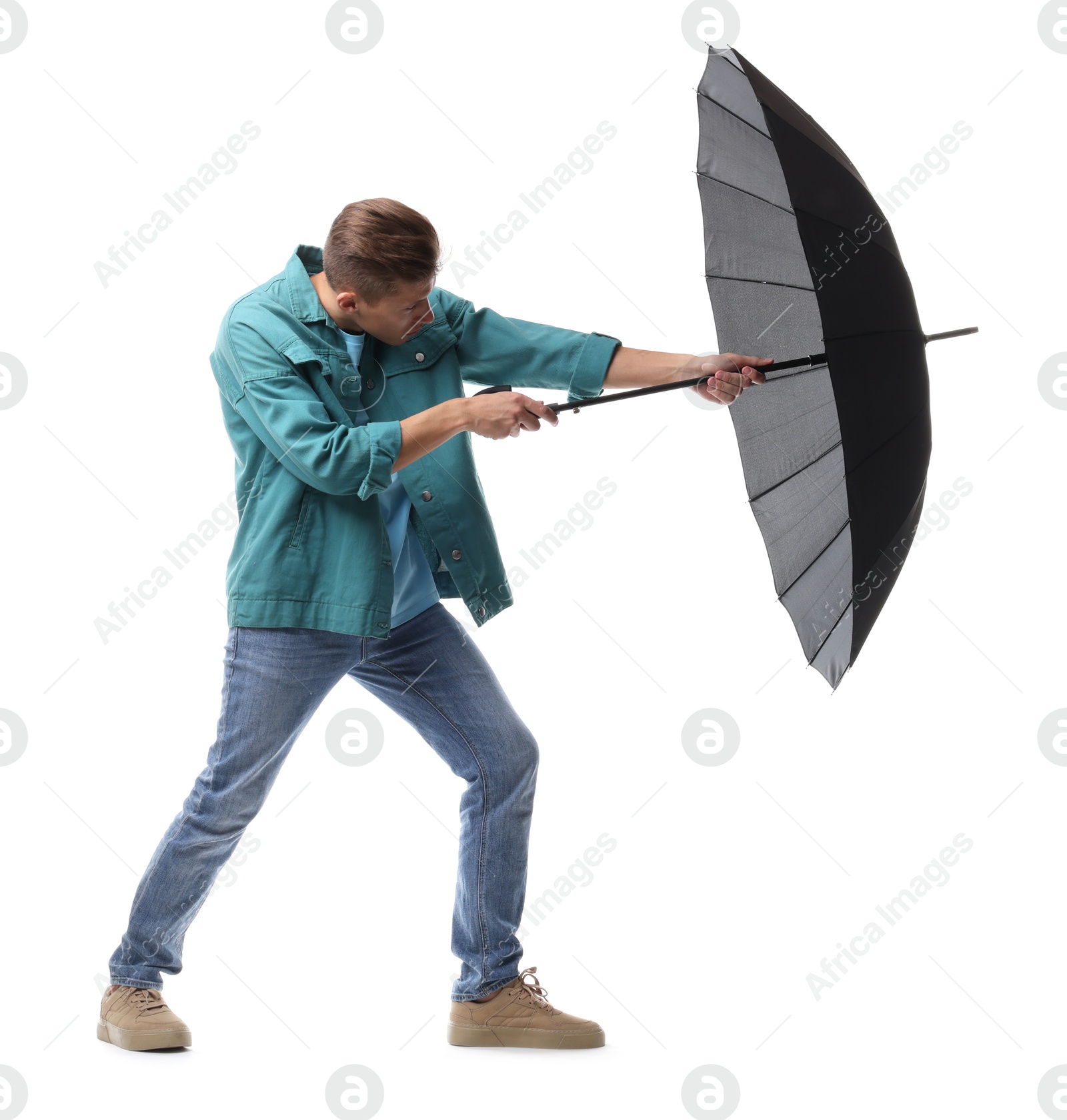 Photo of Man with black umbrella on white background