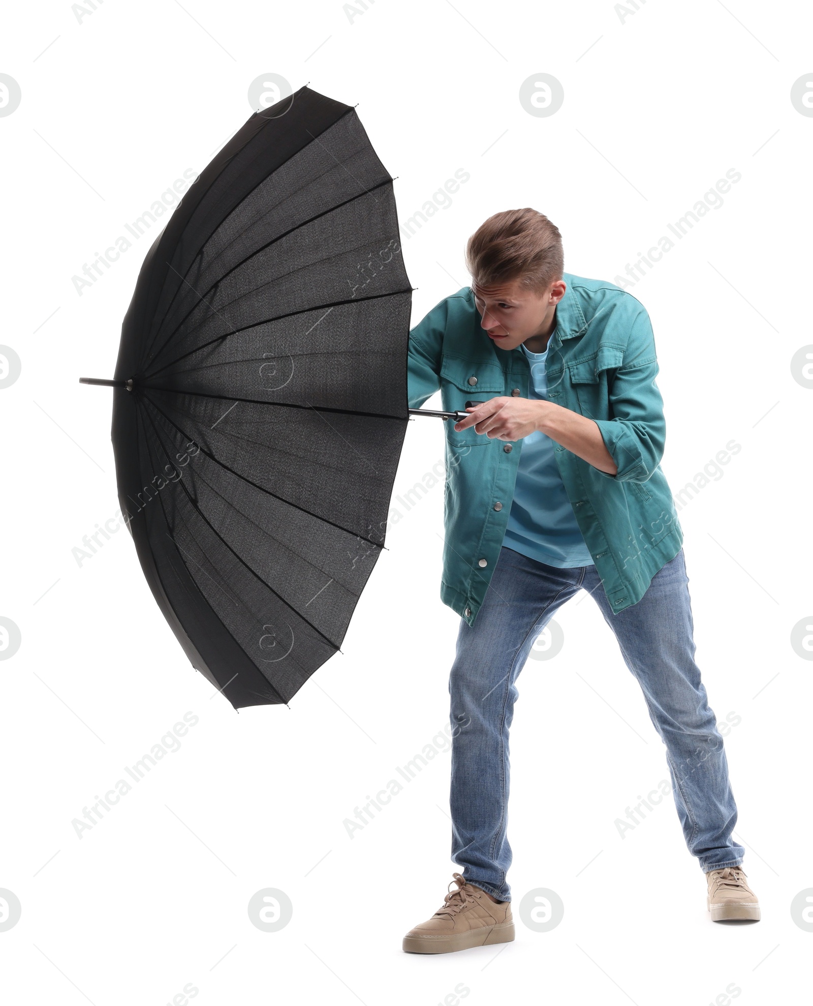 Photo of Man with black umbrella on white background