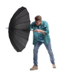 Photo of Man with black umbrella on white background