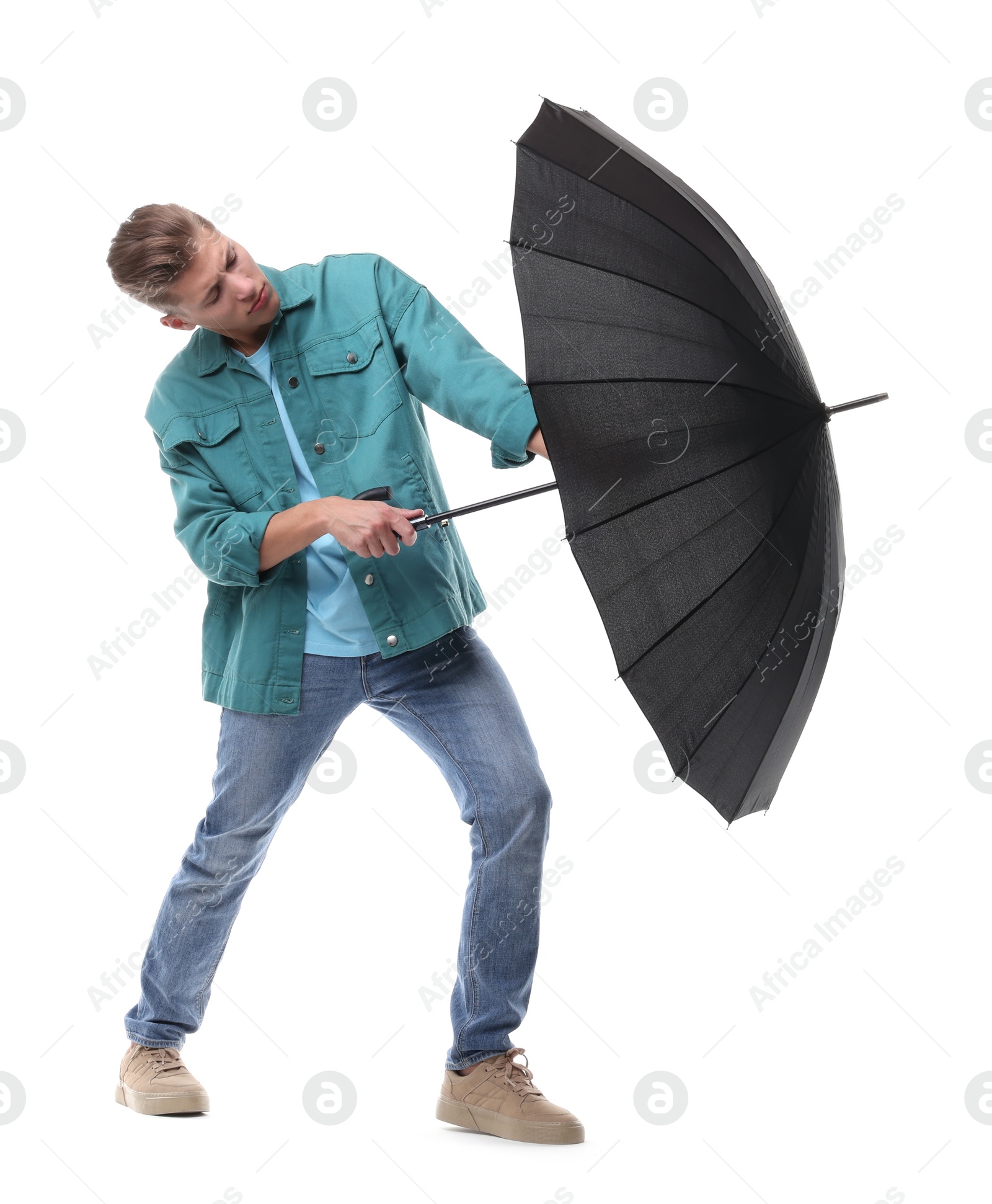 Photo of Man with black umbrella on white background