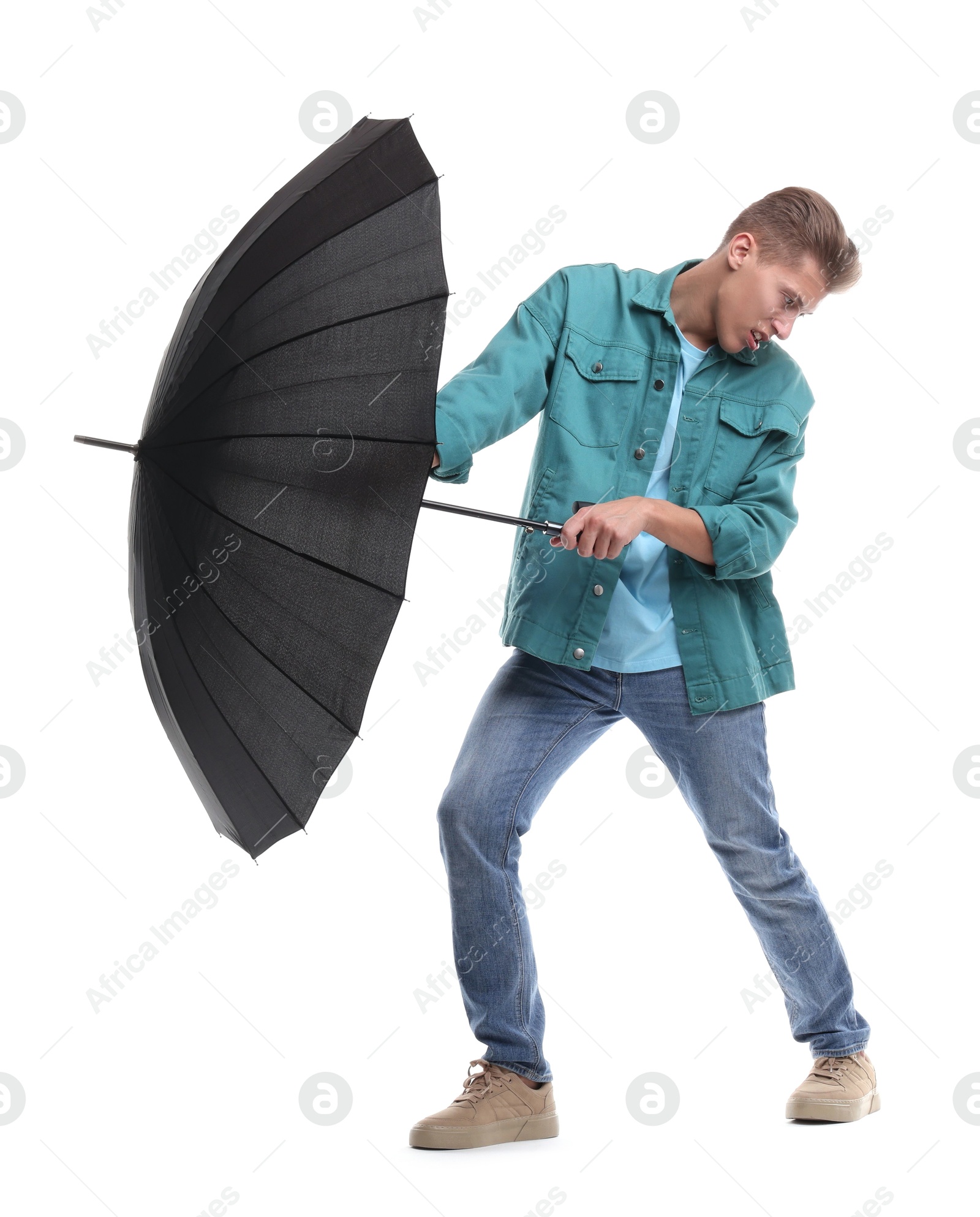 Photo of Man with black umbrella on white background