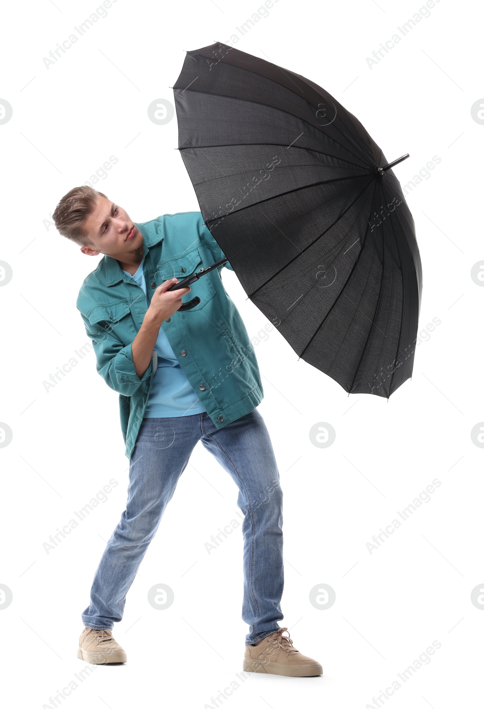 Photo of Man with black umbrella on white background