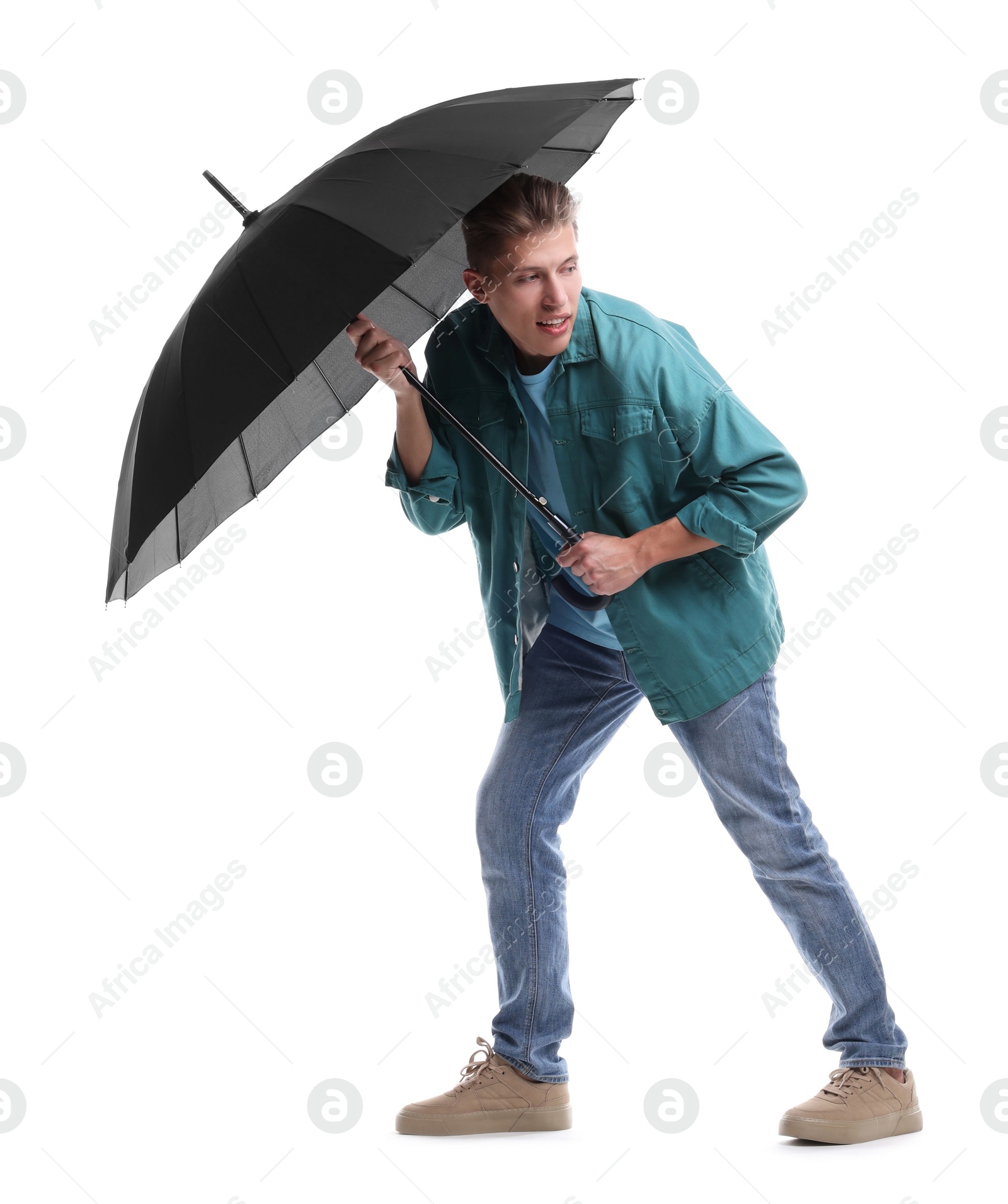 Photo of Man with black umbrella on white background