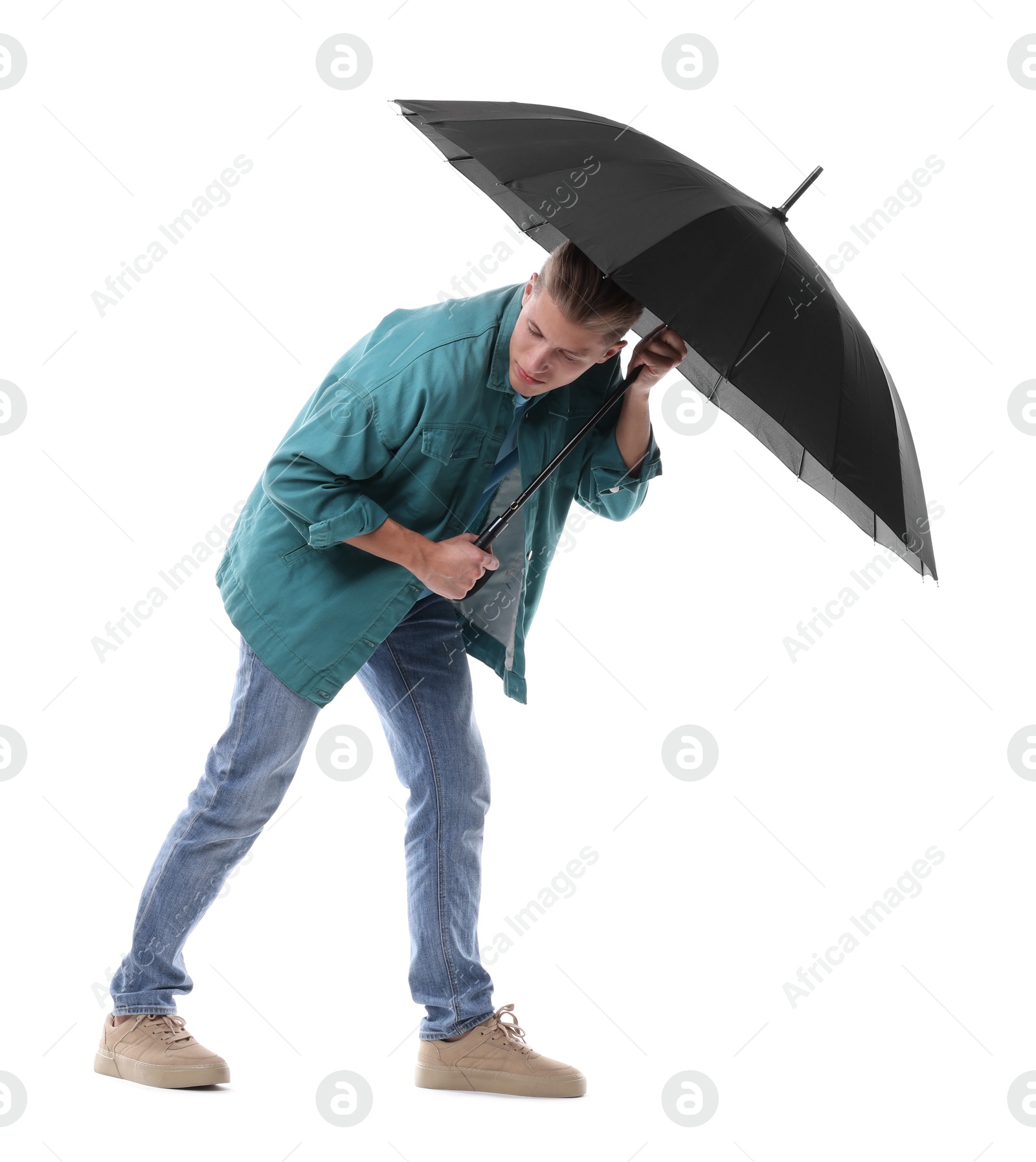 Photo of Man with black umbrella on white background