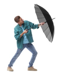 Photo of Man with black umbrella on white background