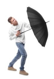 Photo of Man with black umbrella on white background