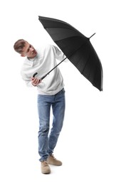 Photo of Man with black umbrella on white background