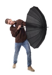 Photo of Man with black umbrella on white background