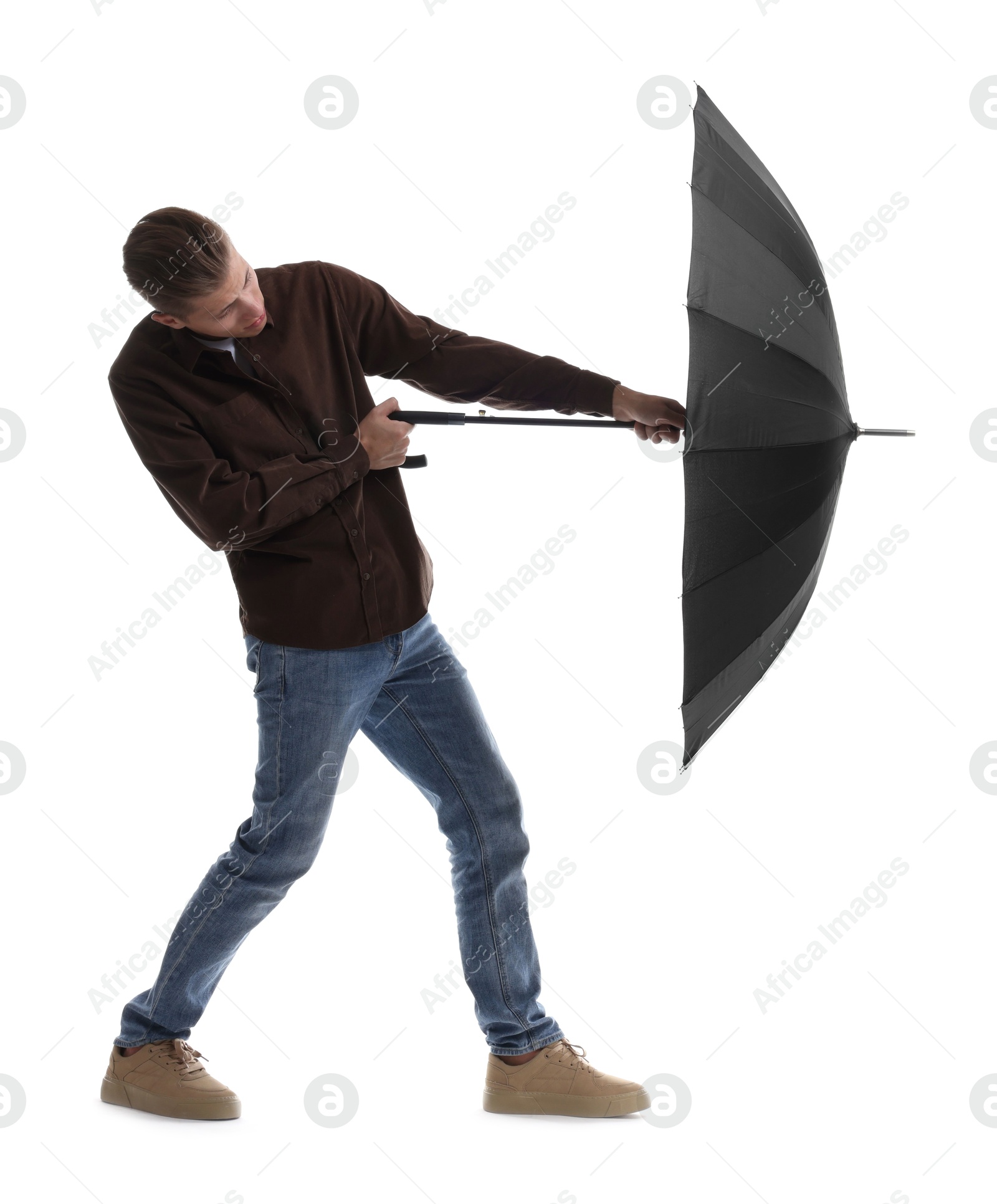 Photo of Man with black umbrella on white background