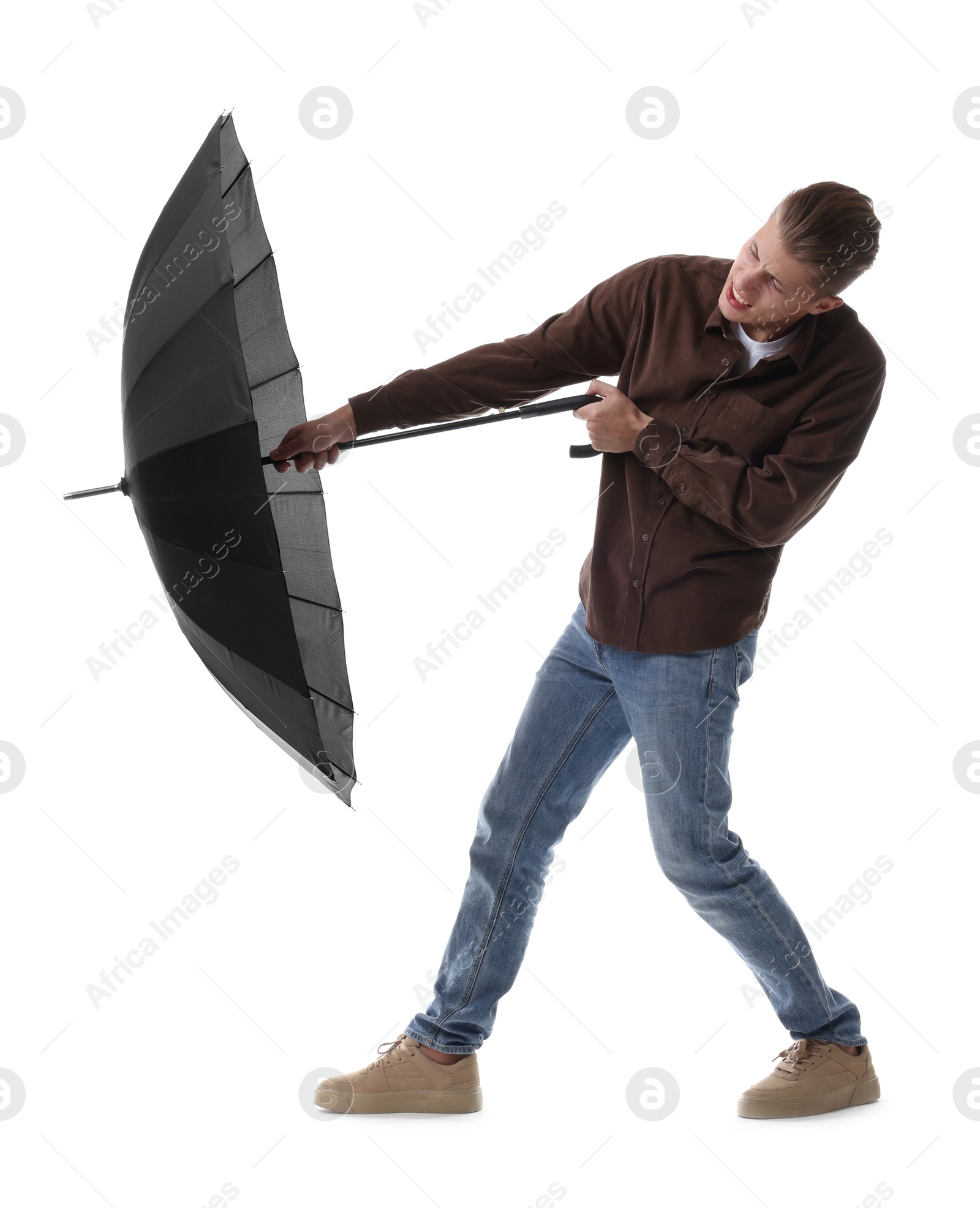 Photo of Man with black umbrella on white background