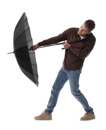 Photo of Man with black umbrella on white background