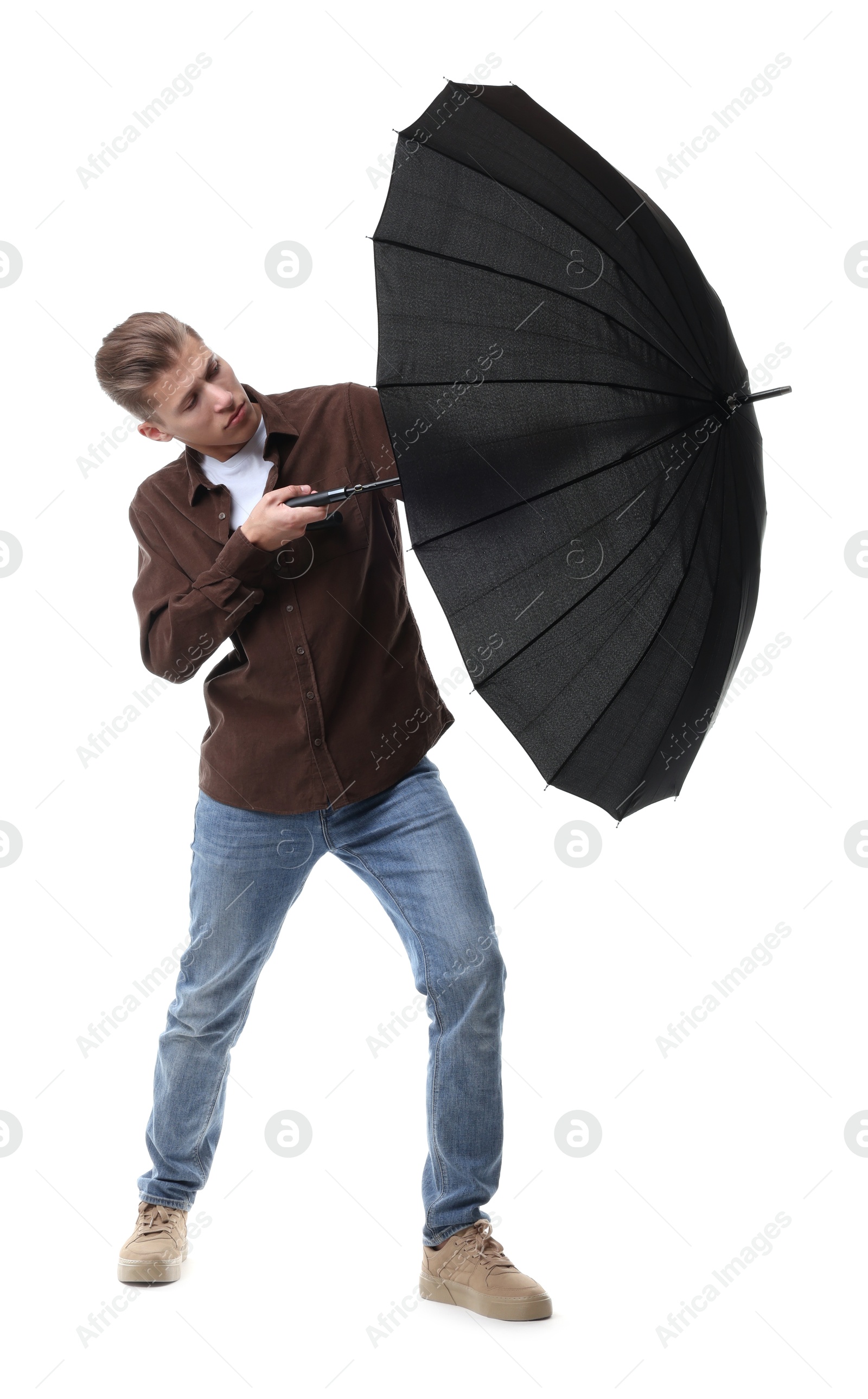 Photo of Man with black umbrella on white background