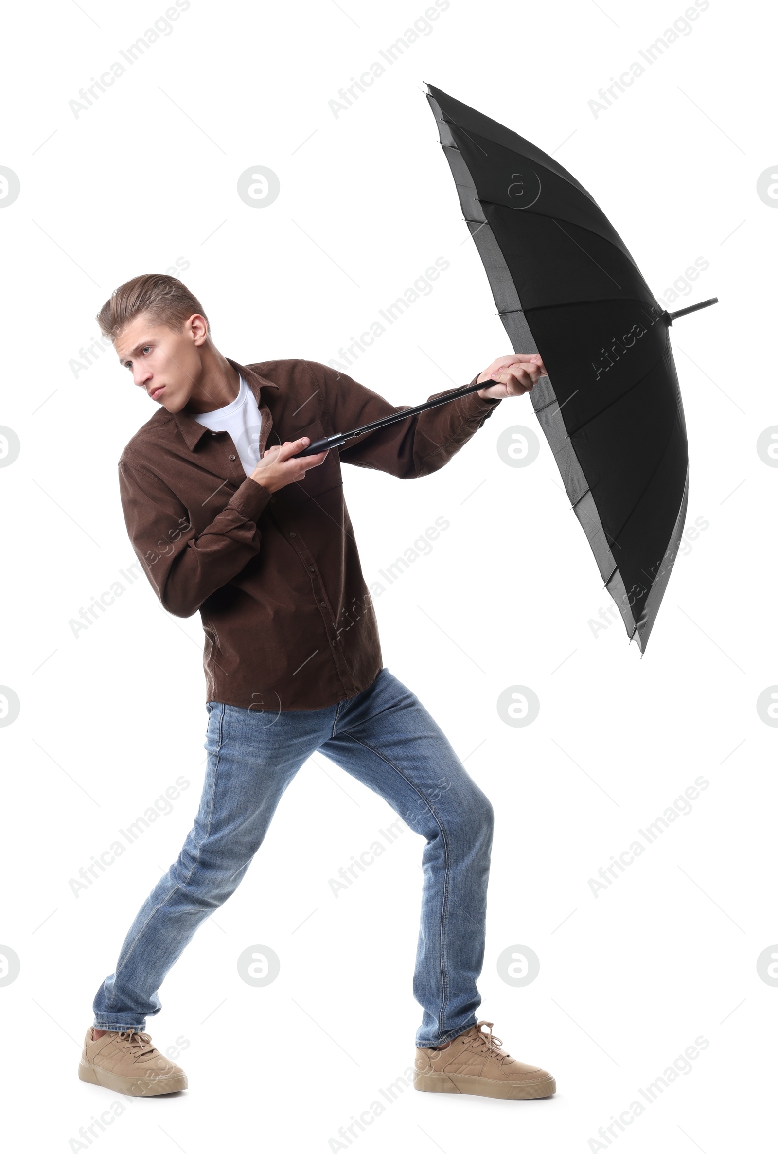 Photo of Man with black umbrella on white background