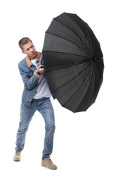 Photo of Man with black umbrella on white background