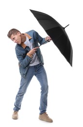 Photo of Man with black umbrella on white background