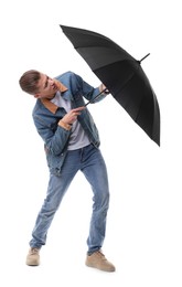 Photo of Man with black umbrella on white background